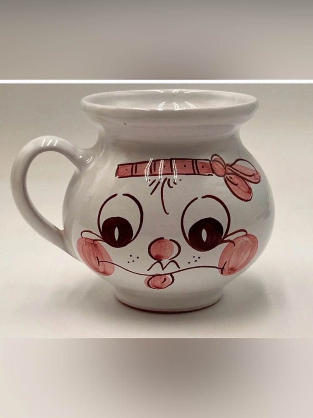 Hand-Painted White Ceramic Double Face Mug with Pink Accents